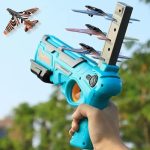 VGRASSP Air Battle Gun Toy with 4 Paper Foam Glider Planes Kids Gadget for Fun Outdoor Sports Activity Catapult Pistol with Continuous Shooting Flyers – Multicolor(Color As Per Stock)