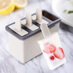 wolpin 4 In 1 Ice Cream Moulds Popsicle Stick Ice Cream Maker Reusable Box Homemade Kulfi Candy Ice Lolly Tray Lid Pp Material, 4 Grid For Kids & Adults (Polypropylene), 12.4 x 5.7 x 8.5 Centimeters